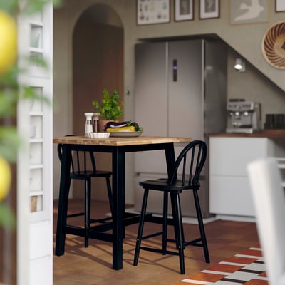 SKOGSTA Table, counter height acacia/black, 29 1/8x29 1/8 "