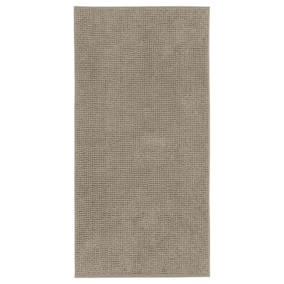TOFTBO bath mat, beige. Rectangular, textured microfiber, soft and quick-drying.