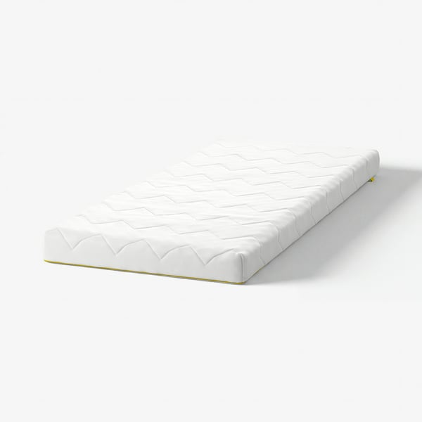 A white UNDERLIG junior mattress, rectangular, with a quilted pattern and gold zip detail.