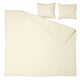 ÄNGSLILJA bedding set in natural colour, featuring a duvet cover and pillowcases made from 100% pre-washed cotton, showcasing a plain, natural design.