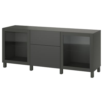 An ikea BESTÅ black sideboard with glass doors and drawers. Its rectangular, modern, and functional.