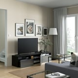 BESTÅ TV bench with drawers and door, black-brown/Riksviken brushed dark pewter effect, 180x42x39 cm