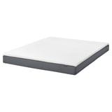 IKEA blåfjellet 5. 5 white foam mattress with grey base, rectangular, simple design.