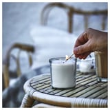 JÄMLIK Scented candle in glass, Vanilla/light beige, 40 hr