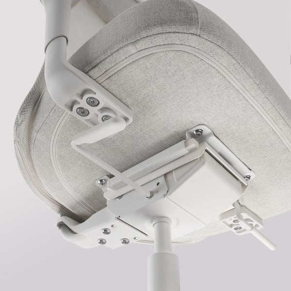 Ergonomic office chair close-up, showing sturdy metal base and airflow backrest for comfort.