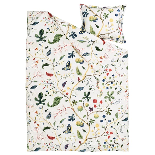 Floral bed set, white with green, yellow, and red patterns, made of cotton and lyocell.
