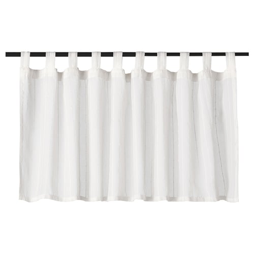 MATILDA white tab top curtains, made from recycled polyester, hanging straight.