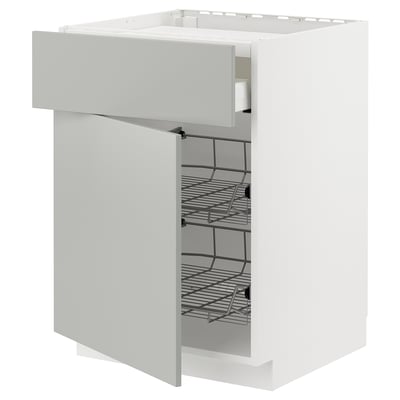 White METOD kitchen cabinet with light grey drawer, wire shelves inside, modern and clean design.
