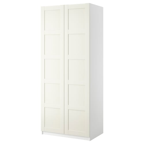 A white PAX wardrobe with two hinged doors, featuring a sleek, minimalist design.