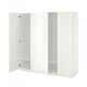 White ikea PAX wardrobe with open doors showing empty shelves.