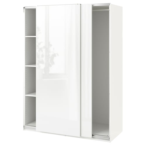 An ikea PAX wardrobe in white with sliding doors. Its minimalist and modern, featuring a sleek design with space-saving sliding doors.