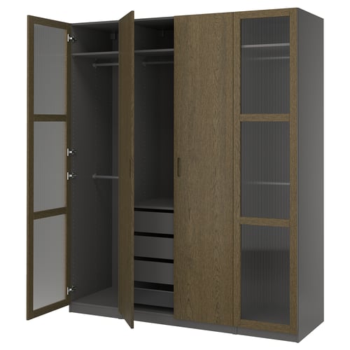 Modern PAX wardrobe in brown wood, open doors revealing hangers and shelves.