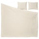 Beige bedding set with duvet and two pillows, featuring wrinkle-chic linen-cotton blend, pre-washed for softness, with envelope-closure pillows.