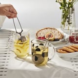 SKEDSTÖR Mug, mixed colours yellow/black, 30 cl