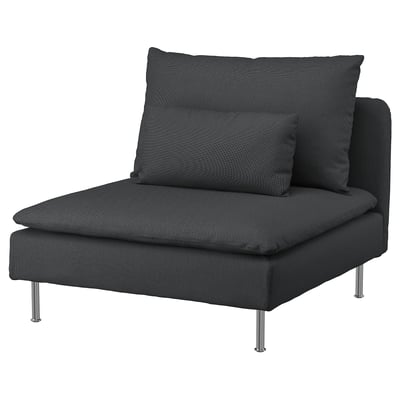 A modern, dark grey SÖDERHAMN chair with a deep, cushioned seat, sleek metal legs, and a patterned pillow.