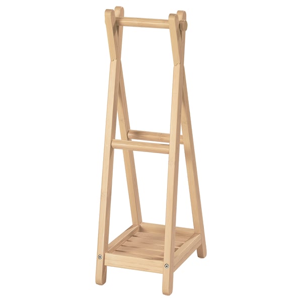 A STEGESUND wooden stand, light brown, rectangular with a simple, clean design.
