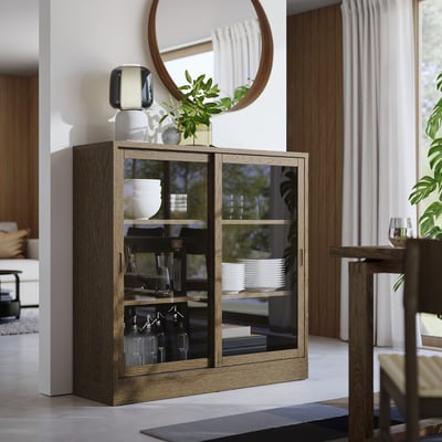 TONSTAD Cabinet with sliding glass doors, brown stained oak veneer, 121x37x120 cm