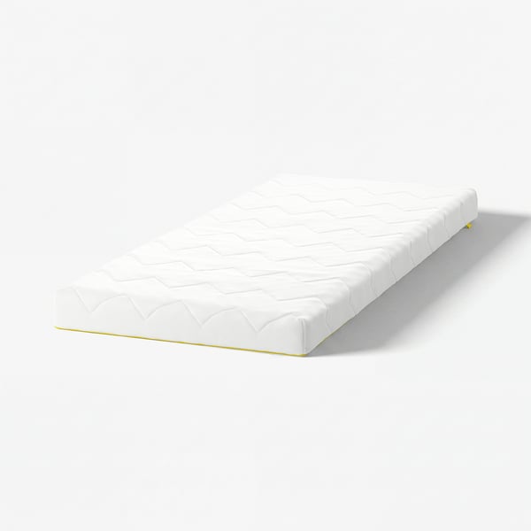 White kids mattress, rectangular, quilted pattern.