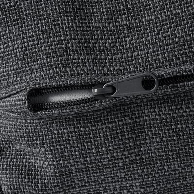 Close-up of grey sofa zip, showcasing quality and durability.