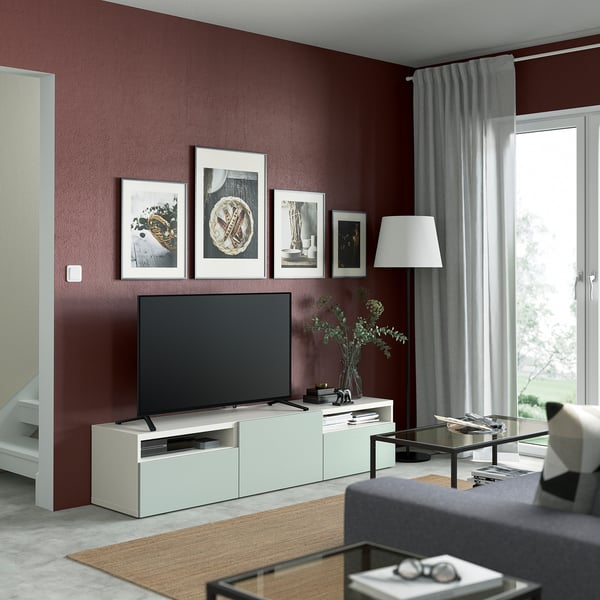 BESTÅ Banc TV avec tiroirs et porte, blanc/Hjortviken gris-vert pâle, 180x42x39 cm
