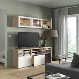 BESTÅ Combinazione TV/ante a vetro, effetto rovere con mordente bianco/Selsviken lucido/vetro trasparente bianco, 180x42x192 cm