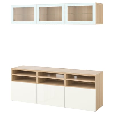 BESTÅ Combinazione TV/ante a vetro, effetto rovere con mordente bianco/Selsviken lucido/vetro trasparente bianco, 180x42x192 cm