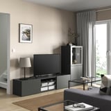 BESTÅ Combinazione TV/ante a vetro, grigio scuro Sindvik/Lappviken grigio scuro, 240x42x129 cm