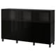 BESTÅ Mobile con ante, marrone-nero Selsviken/Glassvik lucido/vetro trasparente nero, 180x42x112 cm