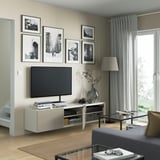 BESTÅ Mobile TV con ante, bianco/Selsviken lucido/beige, 180x42x38 cm