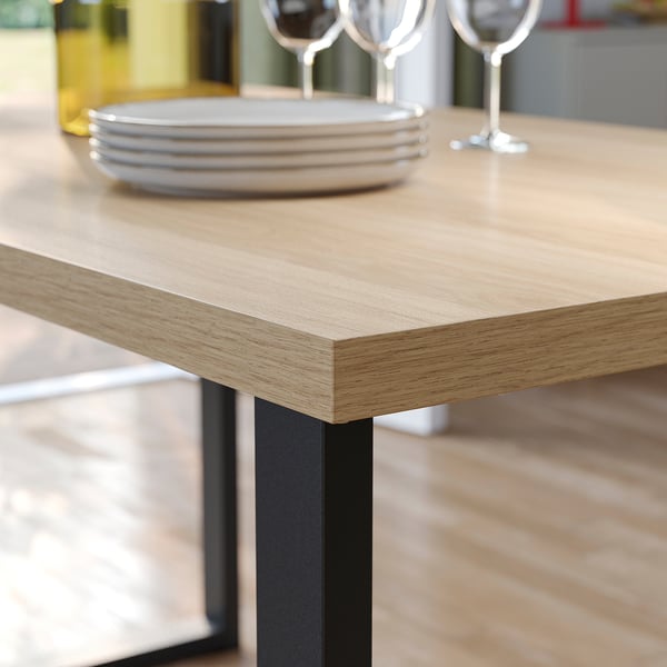 SKÅLSTA Tavolo e 4 sedie, effetto rovere a forma di U nero-grigio/plastica nera metallo tubolare/nero-grigio, 140x80 cm