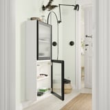 BESTÅ Estante con puertas, blanco/Fällsvik gris oscuro, 60x22x128 cm