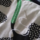 MÄVINN Funda de cojín, blanco hueso negro/floral, 40x58 cm