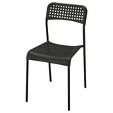 Černá židle ADDE, plastový sedák a opěradlo, ocelové nohy, perforovaný design.