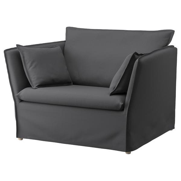Tmavě šedé elegantní křeslo s elegantním designem. Pohodlné k sezení, moderní estetika.
