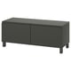 Černá TV stolek IKEA BESTÅ se dvěma dveřmi. Má obdélníkový tvar, s plochou horní částí a rovnými nohavicemi, s moderním designem.