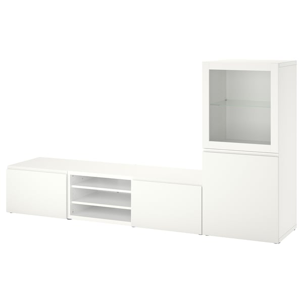 Bílý televizní stolek BESTÅ se sklem a uzavřenými skříňkami, moderní a všestranný pro média a dekorace.
