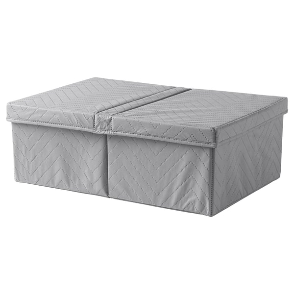 Dva šedé úložné boxy FULLSMOCKAD s odklápěcím víkem, vyrobené z polypropylenové tkaniny a plastu.