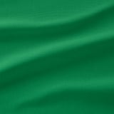 Detail ze zelené látky, hladká vazba, jemný dvoubarevný efekt, vysoce kvalitní textura.