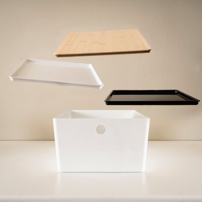 Plovoucí úložná víka a box, ideální pro organizaci a ochranu předmětů před prachem.