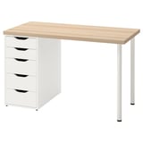 Psací stůl ikea LAGKAPTEN s deskou ze světlého dřeva a bílým úložným dílem s pěti zásuvkami. Psací stůl má elegantní, minimalistický design s kovovými nohami.