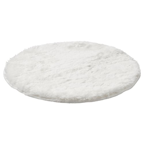 Bílý, kulatý, nadýchaný poduška na židli vyrobený z recyklovaného polyesteru, spodní část, která zůstává na svém místě.