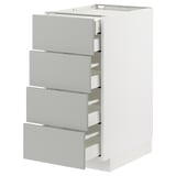 Bílá kuchyňská linka METOD se čtyřmi světle šedými zásuvkami, elegantní moderní design.