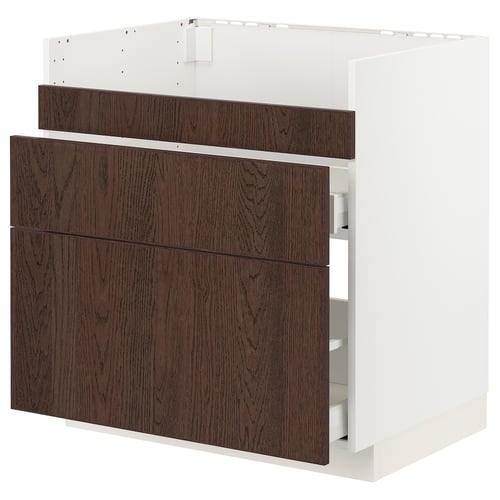 Moderní kuchyňská skříňka v bílé a tmavě hnědé dřevě, tři zásuvky, elegantní design.