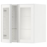 Bílá kuchyňská skříňka METOD se skleněnými dvířky a kovovým rámem, moderní minimalistický design.