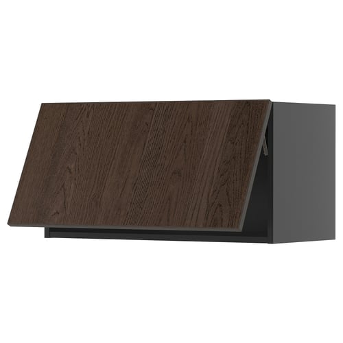 Moderní skříňka z tmavě hnědého dubu s elegantním, šikmým designem.