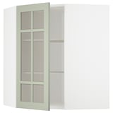 Zelená kuchyňská skříňka ikea METOD s polohovatelnými policemi a skleněnými dvířky v mřížkovém vzoru.