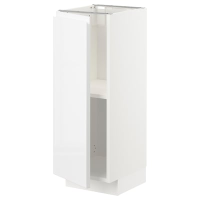 Bílá kuchyňská skříňka METOD s elegantním, moderním designem a povrchovou úpravou ve vysokém lesku. Má nastavitelné police a minimalistické dveře bez úchytek.