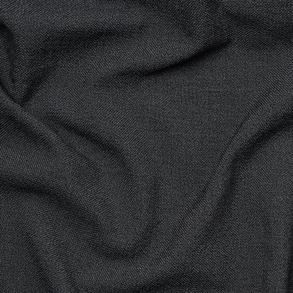 Černá tkanina detail, ukazující odolnou, texturovanou vazbu.