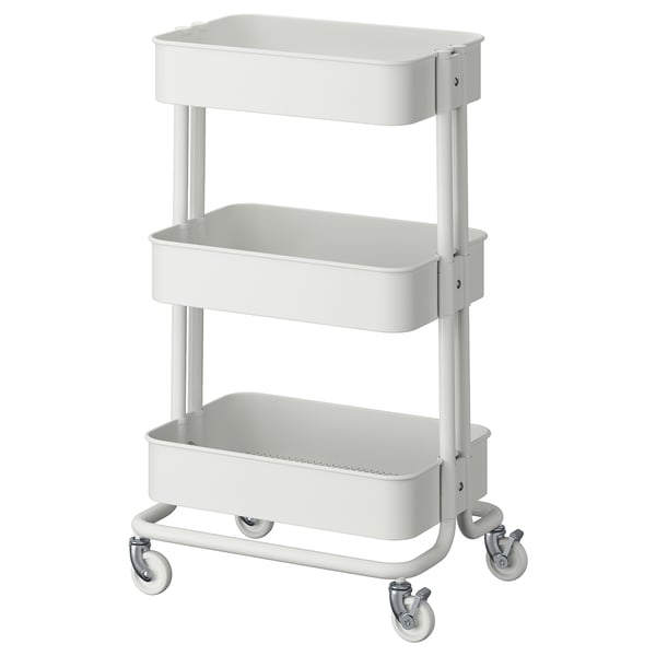 Ikea RÅSKOG: kompaktní, bílý, 3patrový úložný vozík na kolečkách pro malé prostory, robustní design.