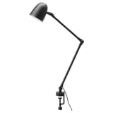 Černá lampa SKURUP s nastavitelným ramenem a stínidlem, navržená pro všestranné použití jako stolní i nástěnná lampa.